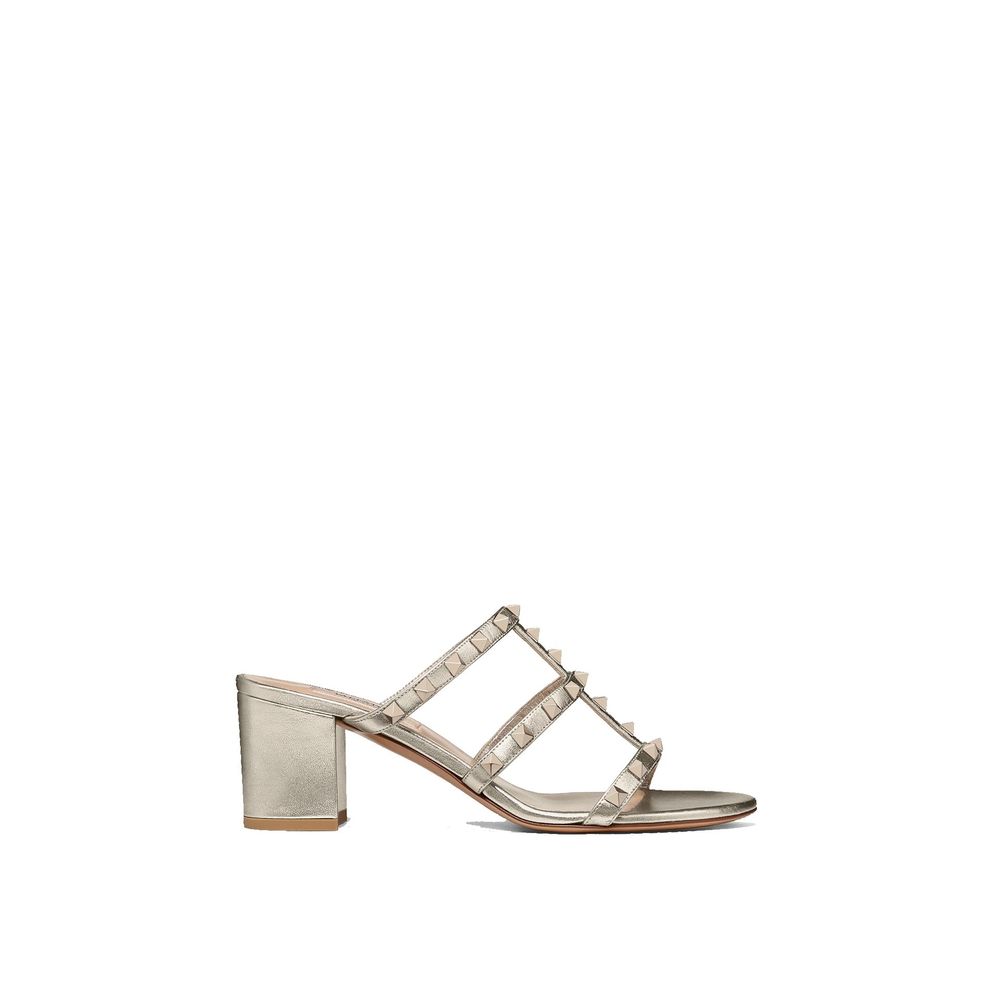 Valentino Garavani Mules aus Kalbsleder in Gold