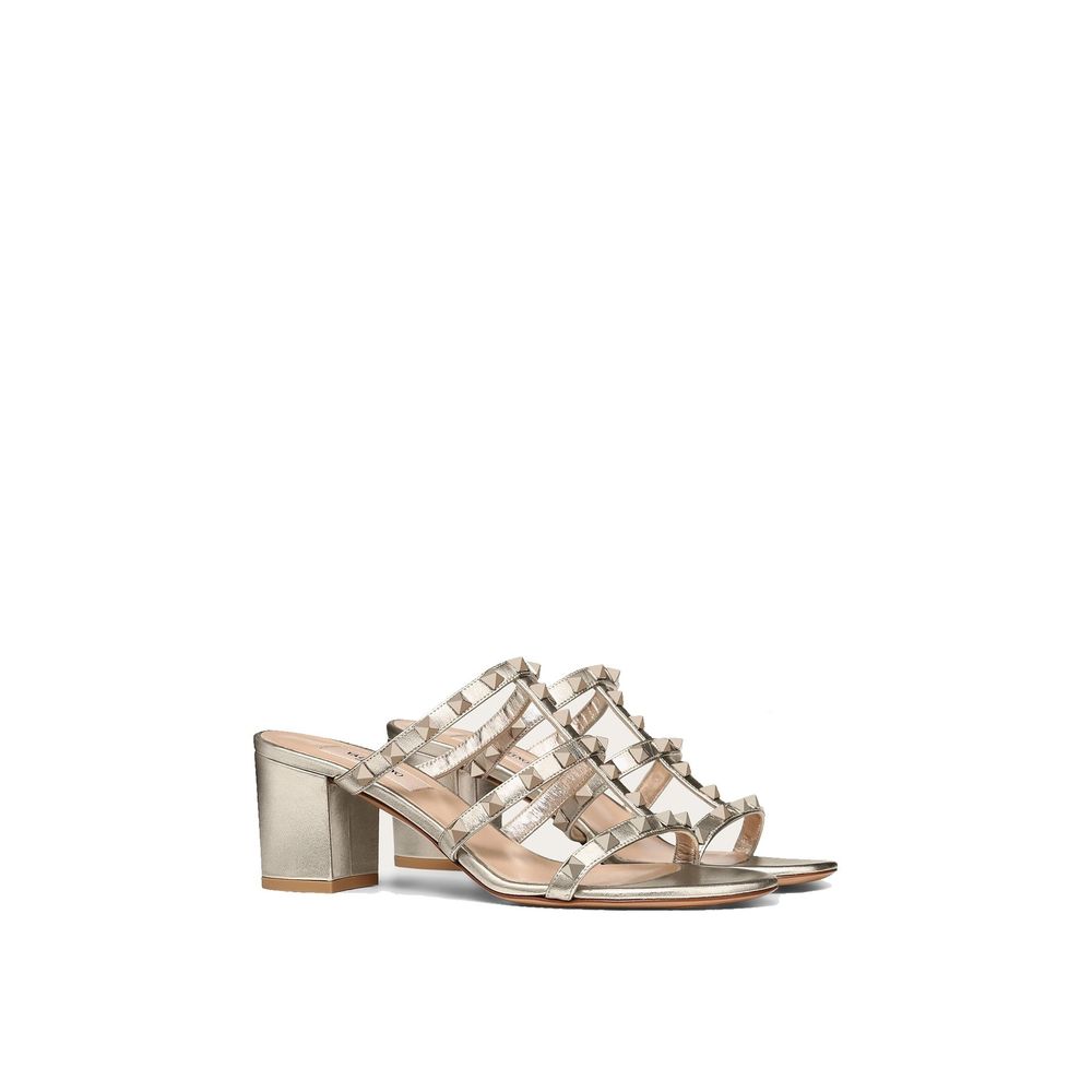 Valentino Garavani Mules aus Kalbsleder in Gold