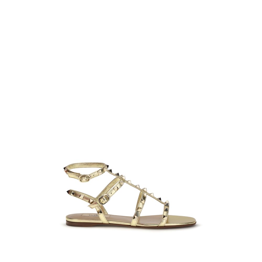 Valentino Garavani Flache Sandalen aus Kalbsleder Bos Taurus in Gold