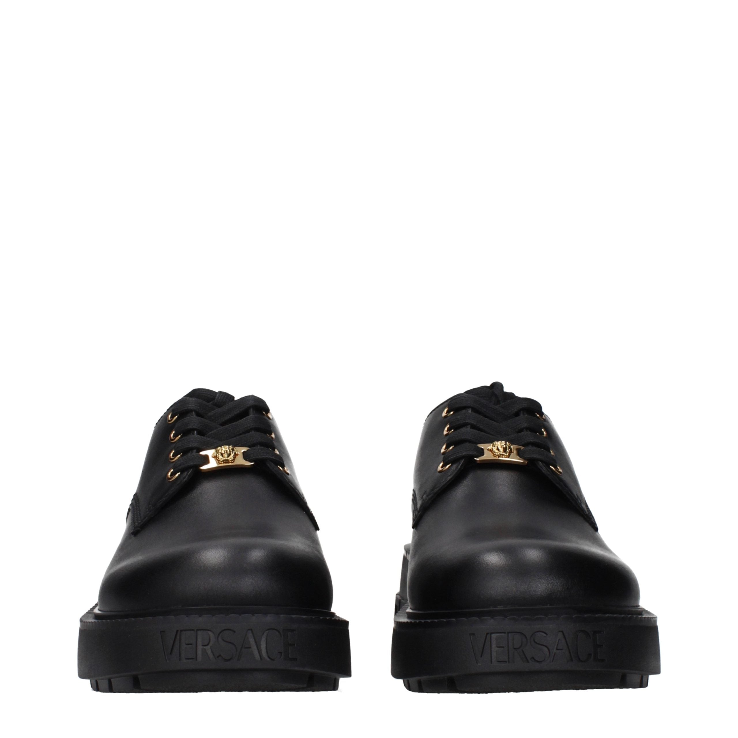 Versace Schwarze Oxford- und Derby-Schuhe aus Leder