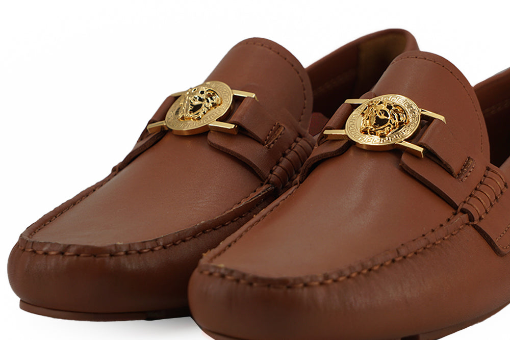 Versace Elegant Loafers in Leather with Medusa Embossed