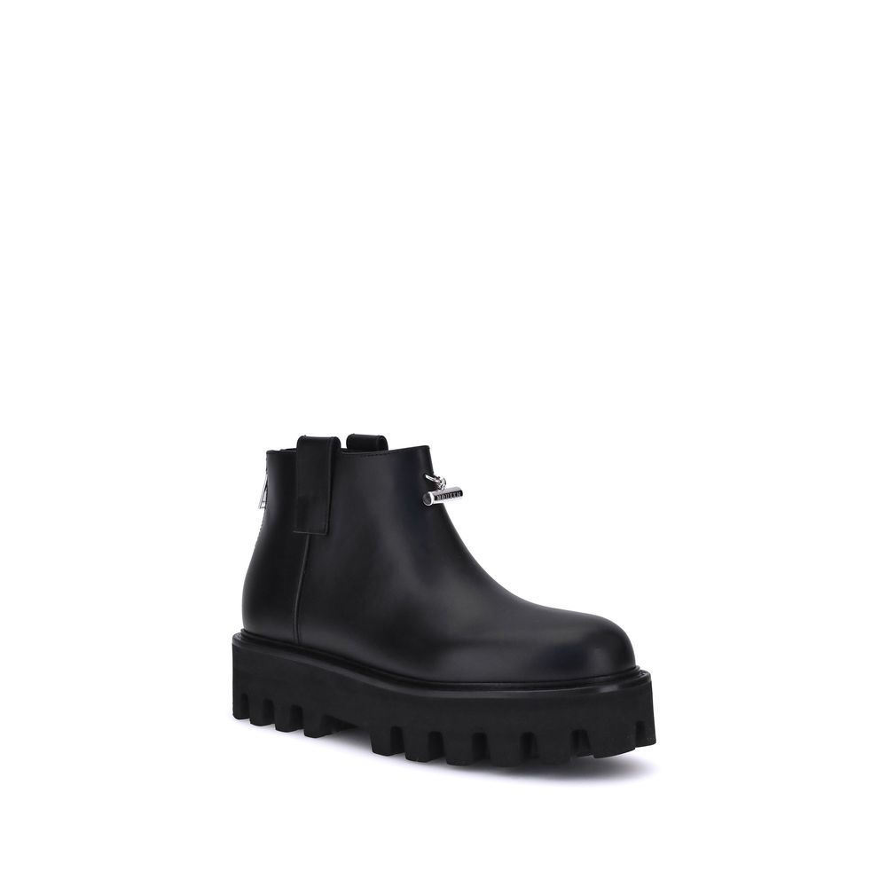 Bottines Alexander McQueen en cuir de veau noir Bos Taurus