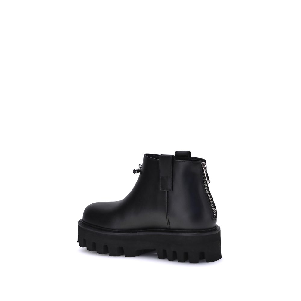 Bottines Alexander McQueen en cuir de veau noir Bos Taurus