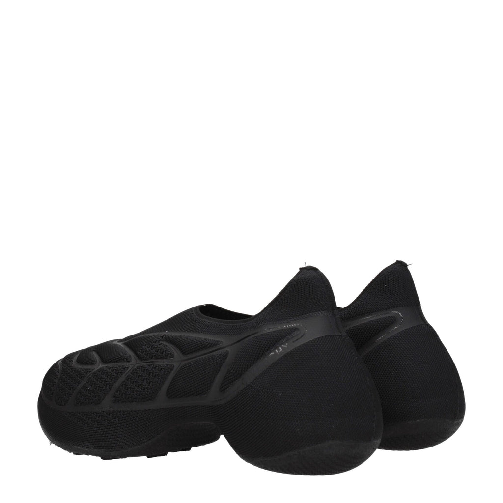 Givenchy Slipper aus schwarzem Stoff