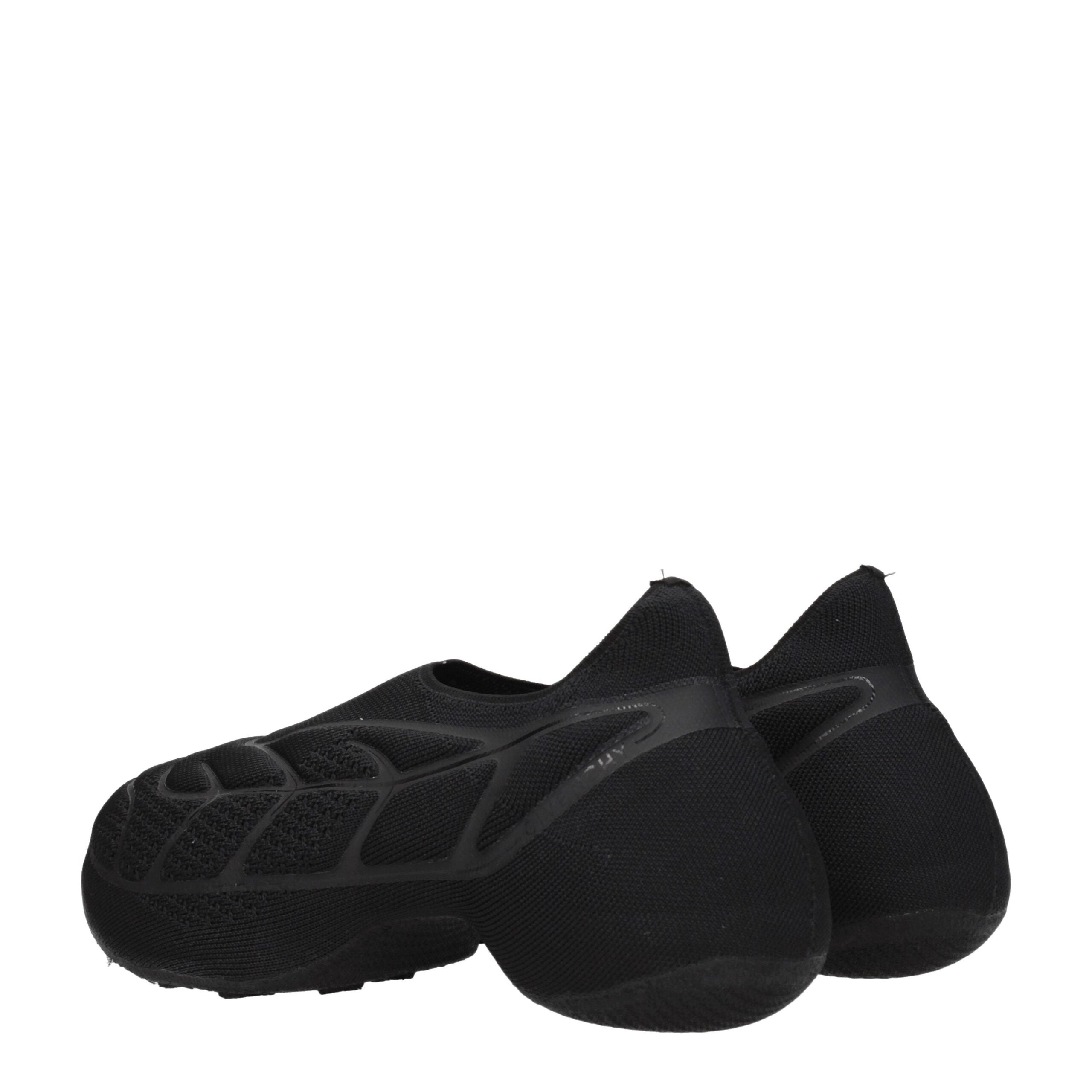 Givenchy Slipper aus schwarzem Stoff