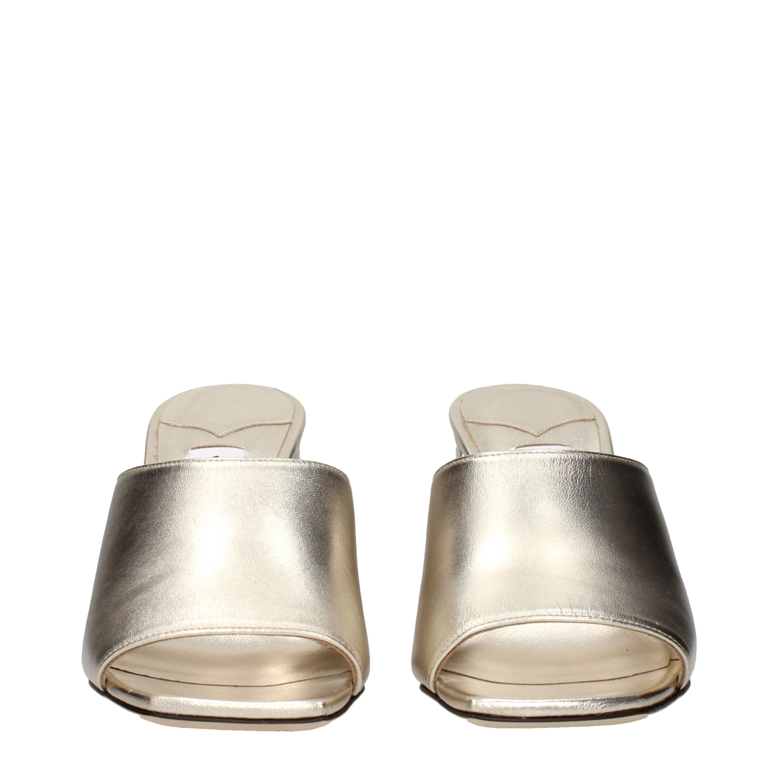 Jimmy Choo Goldene Ledersandalen mit Plateauabsatz